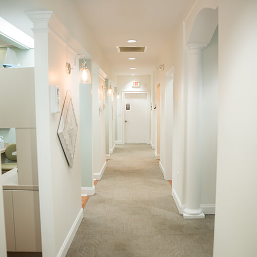 The hallway connecting different treatment rooms at Creekside Dentistry